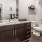Bathroom with ample countertop space and a full shower bath combination